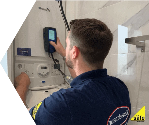 Plumber installing outside tap
