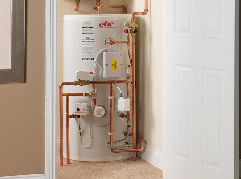 Plumber installing outside tap
