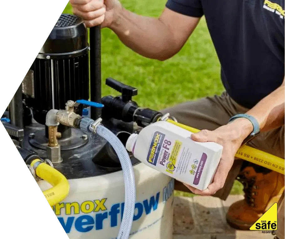 Plumber installing outside tap